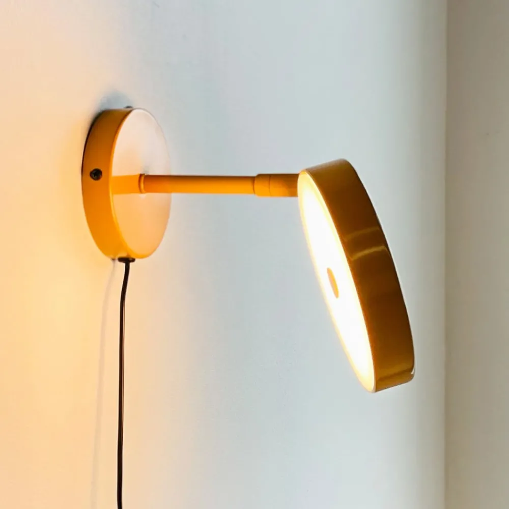Dyberg Larsen Væglamper > LED-væglampe Starlight, gul, Ø 14 cm dæmpbar