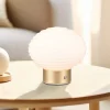 Bordlamper ^ Reality Leuchten Earl LED genopladelig bordlampe, messing/opal, højde 14,5 cm, glas