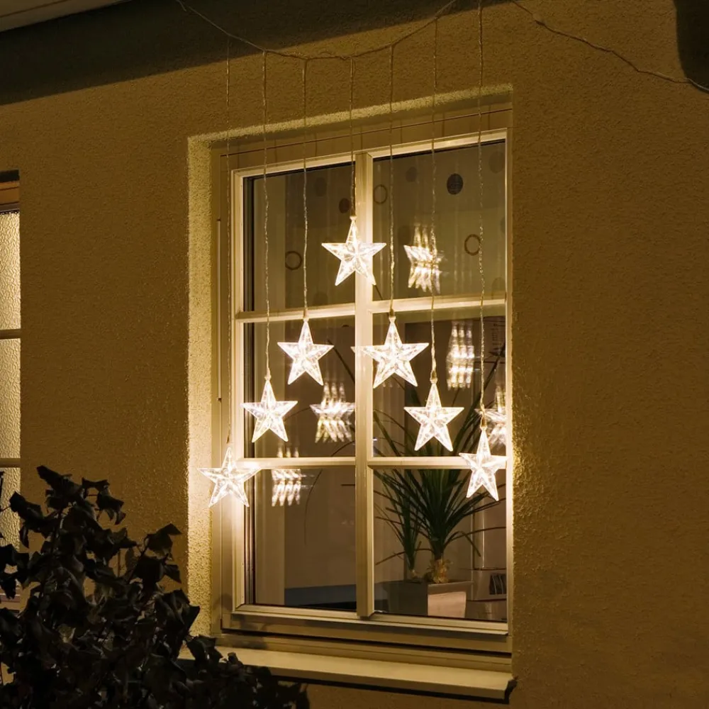 Konstsmide Christmas Dekorationsbelysning|Julepynt > LED-lysgardin med 7 stjerner, varm hvid