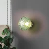 Reality Leuchten Væglamper > LED-væglampe Earl, messing/grøn, glas, Ø 15,5 cm