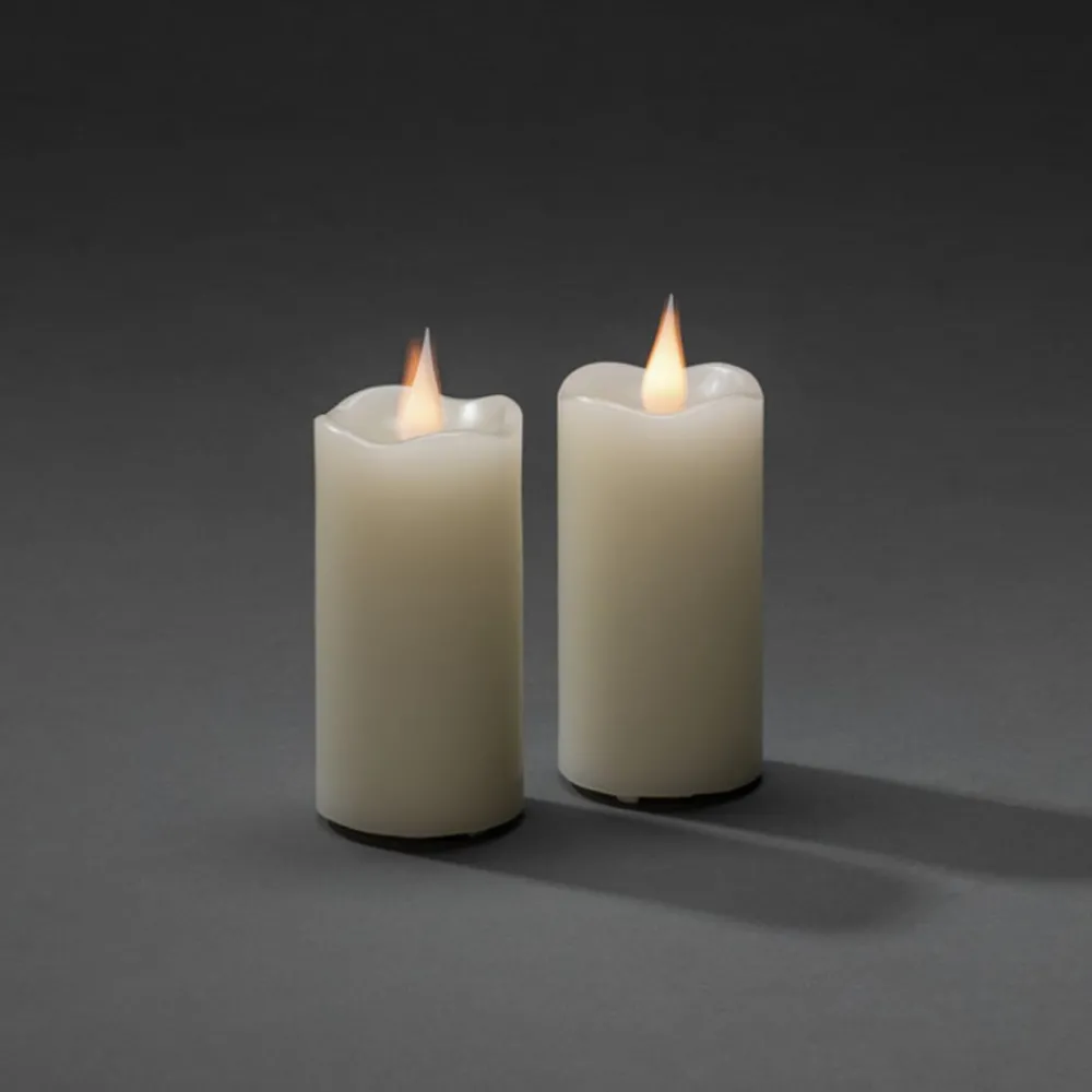 Konstsmide Christmas Dekorationsbelysning|Julepynt > LED-vokslys creme, lysfarve ravgul, Ø 7,5 cm 2 stk