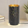 Lindby Bordlamper > bordlampe Aralena, sort/guld, højde 26,5 cm