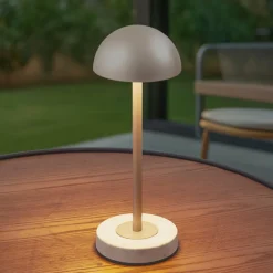 Dekorationsbelysning|Terrassebelysning ^ Lindby LED-batteridrevet bordlampe Pippin, guld/travertin, IP44
