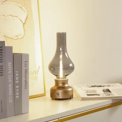 Lindby Bordlamper > LED genopladelig bordlampe Maxentius guldfarvet glas dæmper