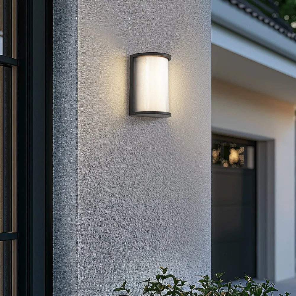 Terrassebelysning ^ Lindby udendørs LED-væglampe Calvik, sort, riflet, IP44