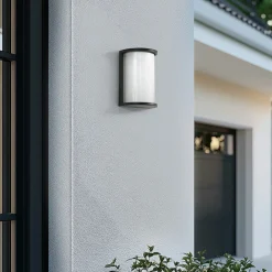 Terrassebelysning ^ Lindby udendørs LED-væglampe Calvik, sort, riflet, IP44