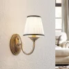 Gang|Pendellamper ^ Lindby væglampe Lumiel, creme/messing, tekstil, 27 cm