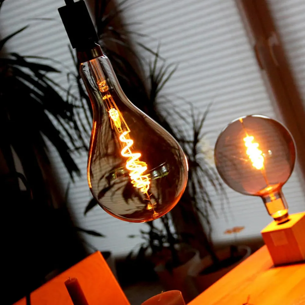 Filament Pære|Smarte Lyskilder ^ tint Müller Licht white LED-pære E27 4,9 W guld