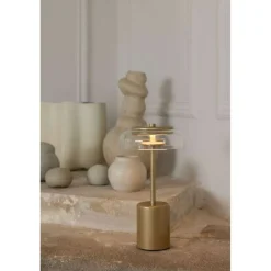 Dekorationsbelysning ^ Nuura Aps Nuura LED-batteridrevet bordlampe Blossi, højde 26 cm, guldfarvet/klar