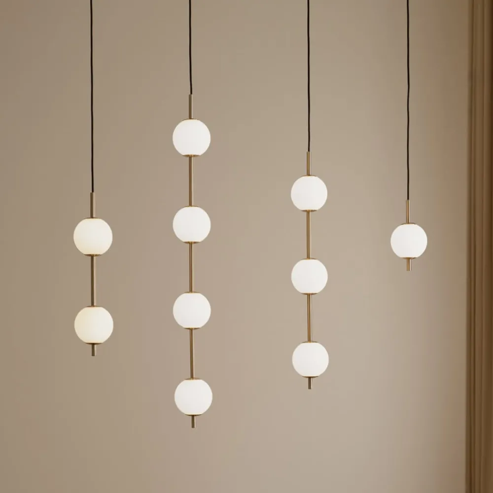 Pendellamper ^ UMAGE LED-hængelampe Audrey, messingfarvet, 2 lyskilder Ø 12 cm
