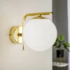 Domiluce Gang|Pendellamper > Væglampe Aurora, guldfarvet, glas, 17 cm høj, kugle, E14